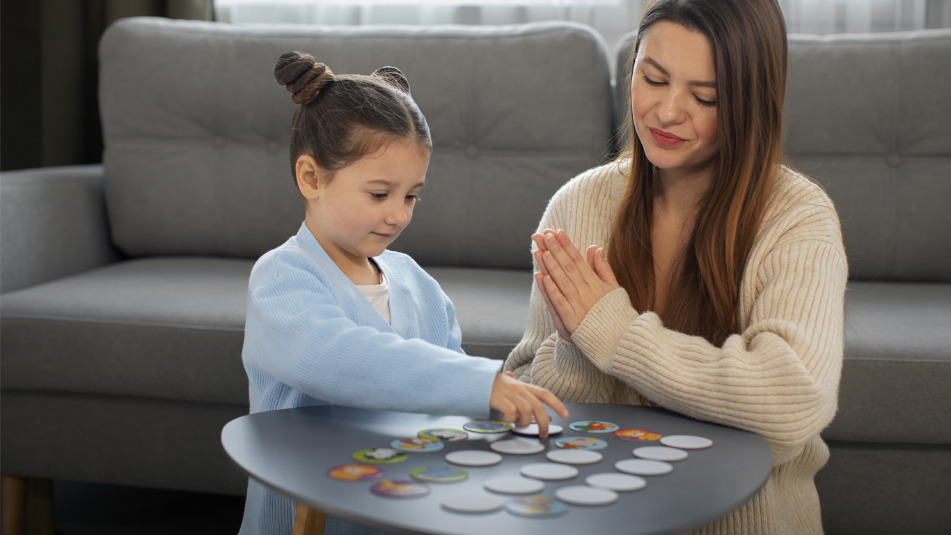 front-view-mother-girl-playing-game